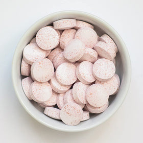 Hyalogic Acide Hyaluronique 60 Pastilles sur une table