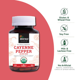 Incas poivre cayenne capsules sur une surface en bois
