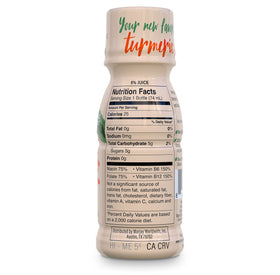 Ingrédients naturels des shots de curcuma Turmeric Time sur une table
