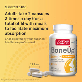 Jarrow Formulas BoneUp sur une table avec un verre d'eau