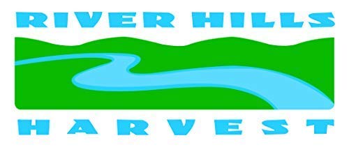 Jus de sureau River Hills Harvest sur une table avec des fruits