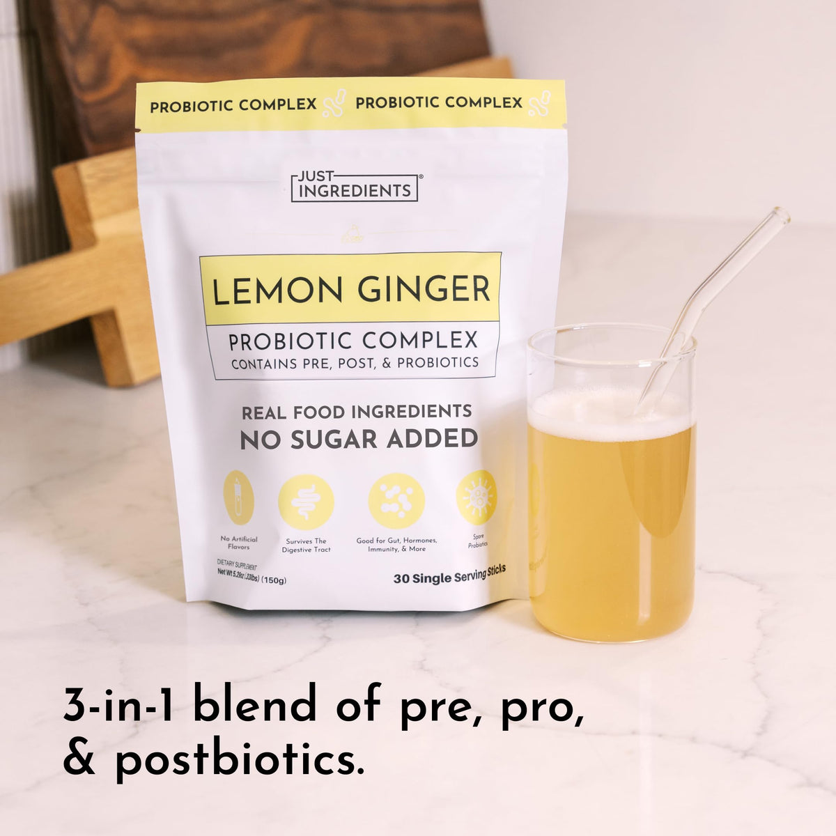 JUST INGREDIENTS Probiotique Citron Gingembre mélange dans un verre d'eau