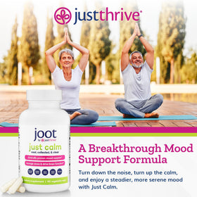 Just Thrive Just Calm capsules sur une surface en bois