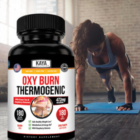 Kaya Naturals Oxy Burn sur un bureau avec des équipements de sport