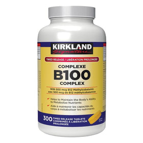 KIRKLAND Complexe B100 300 comprimés sur une surface en bois