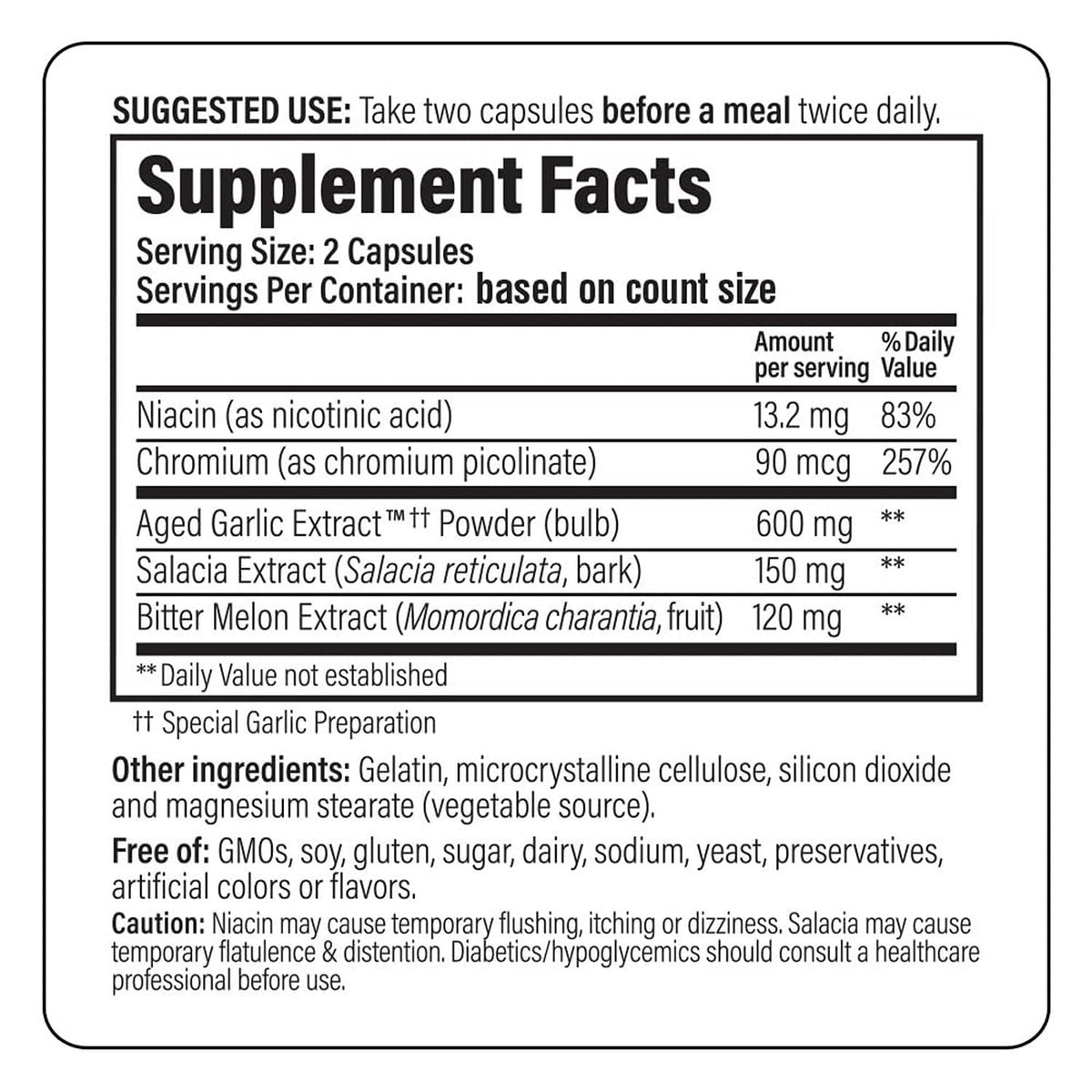 Kyolic Aged Garlic Extract 100 capsules sur une table en bois