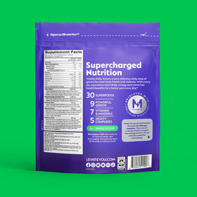 L'Evate You Vitality Daily Greens 200g powder on a kitchen counter