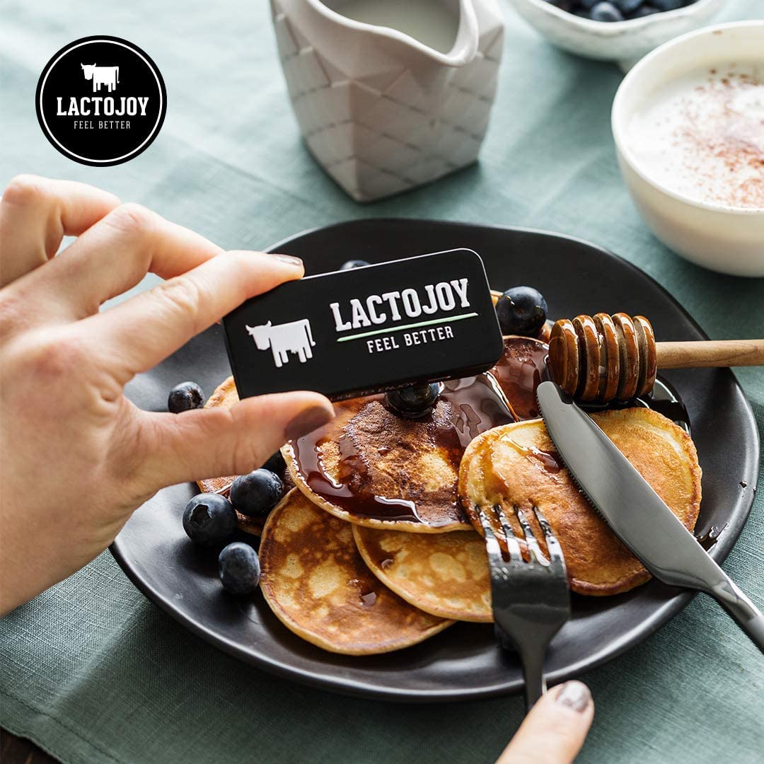 LactoJoy Lactase gélules sur un fond neutre