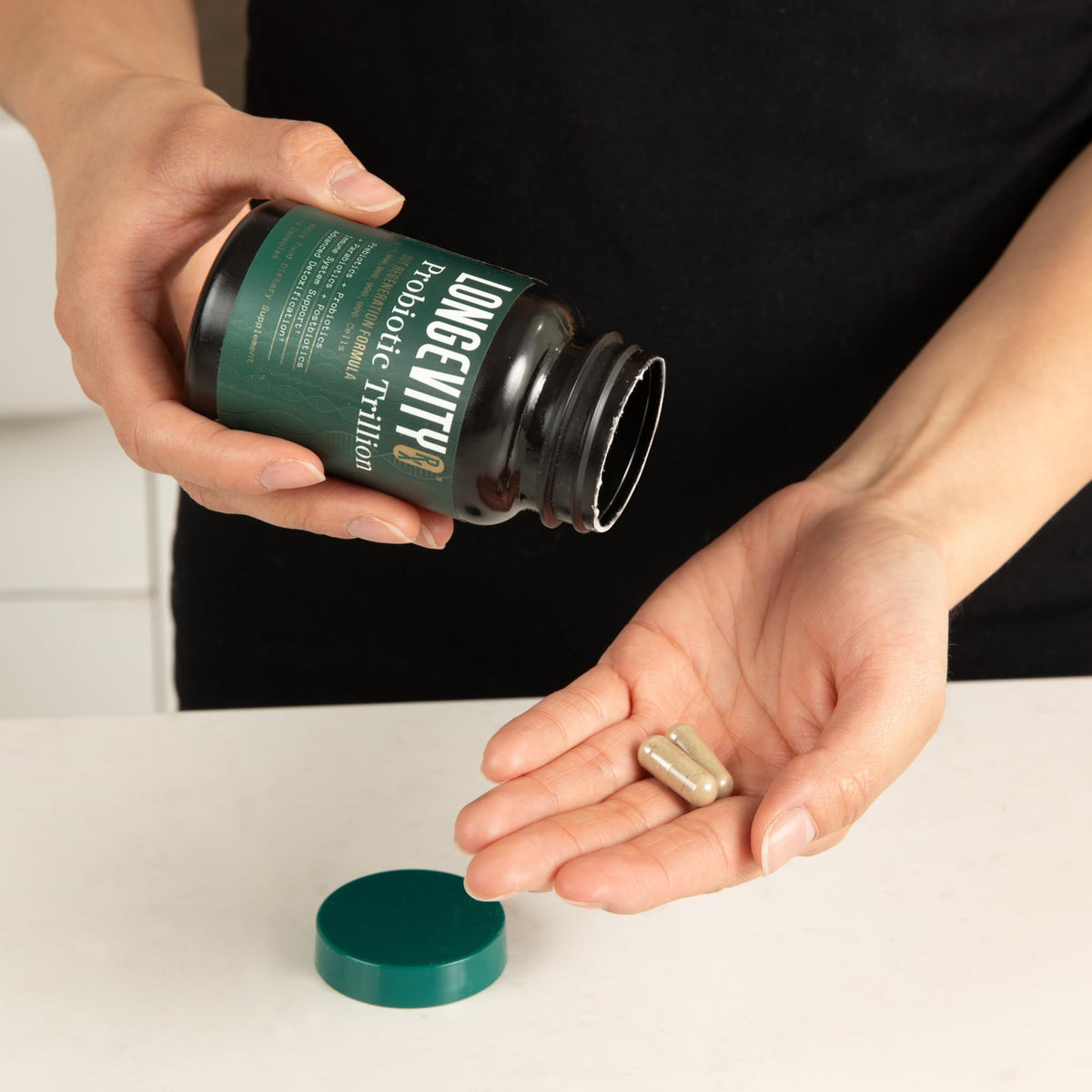 Longevity Rx Probiotic Trillion capsule on wooden table