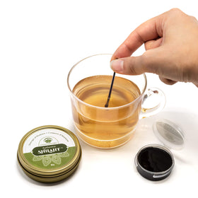 Lotus Blooming Herbs Shilajit résine en texture noire et visqueuse