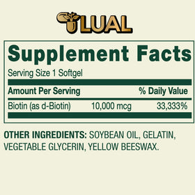 LUAL Biotine 10 000 mcg comprimés sur une surface blanche