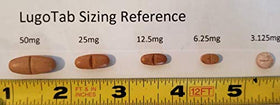 LugoTab 25 mg tablettes, prise en main avec vue de côté