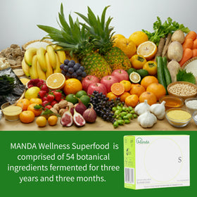 Manda Wellness Superdrink sachets sur une table en bois