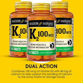 MASON NATURAL Complément Alimentaire K2 100 mcg avec Calcium, comprimés sur une surface blanche