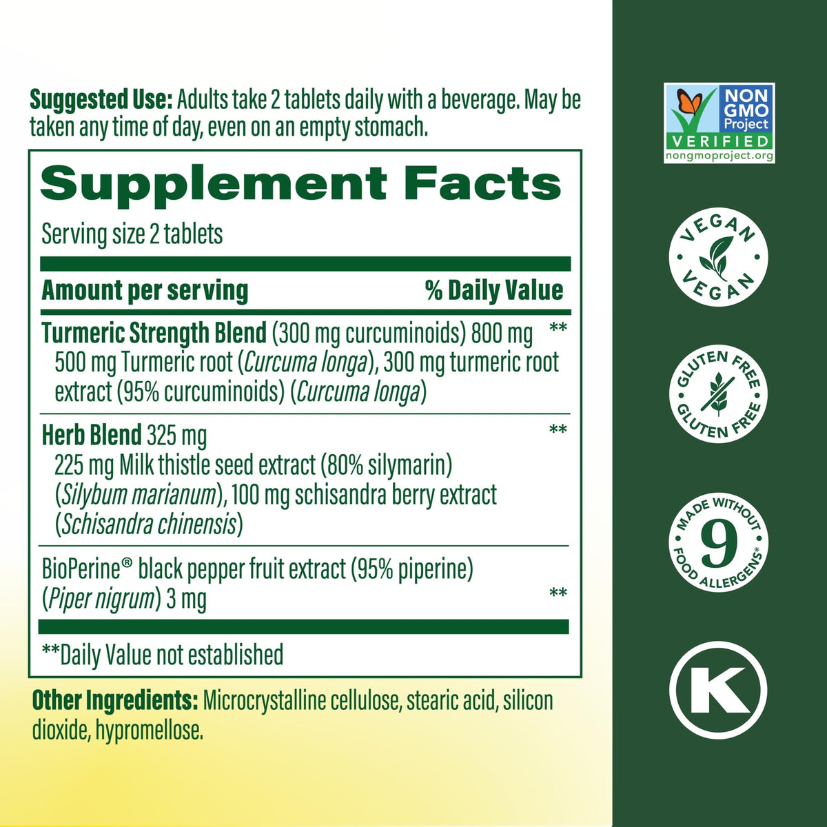 MegaFood Curcuma + Chardon-Marie tablettes sur une surface en bois