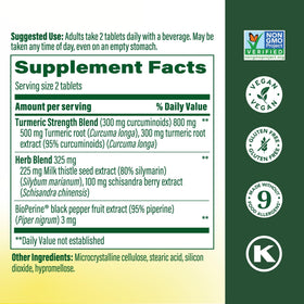 MegaFood Curcuma + Chardon-Marie tablettes sur une surface en bois