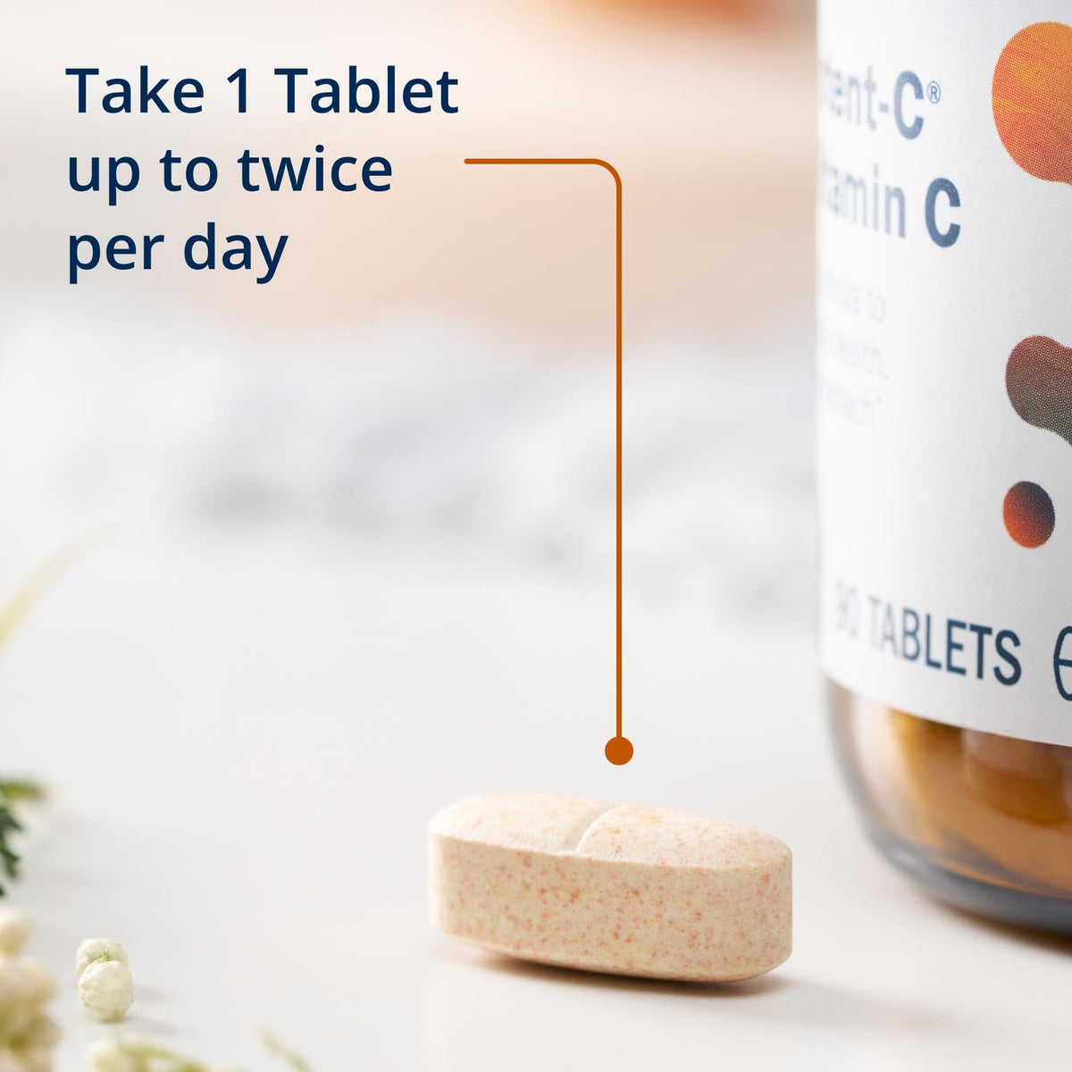 Metagenics Ultra Potent-C 1000mg comprimés sur un fond neutre
