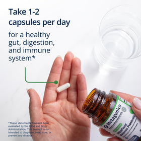 Metagenics UltraFlora Probiotique 120 capsules avec un verre d'eau