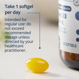 Metagenics Vitamine D3 et K2 5 000 UI, gélules sur une table