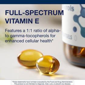 Metagenics Vitamine E gélules molles sur fond blanc