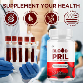 MJO BloodPril Capsules sur une table avec des ingrédients naturels en arrière-plan