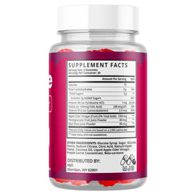 MJO Gumitide Gummies 120 Gummies à côté d'un verre d'eau