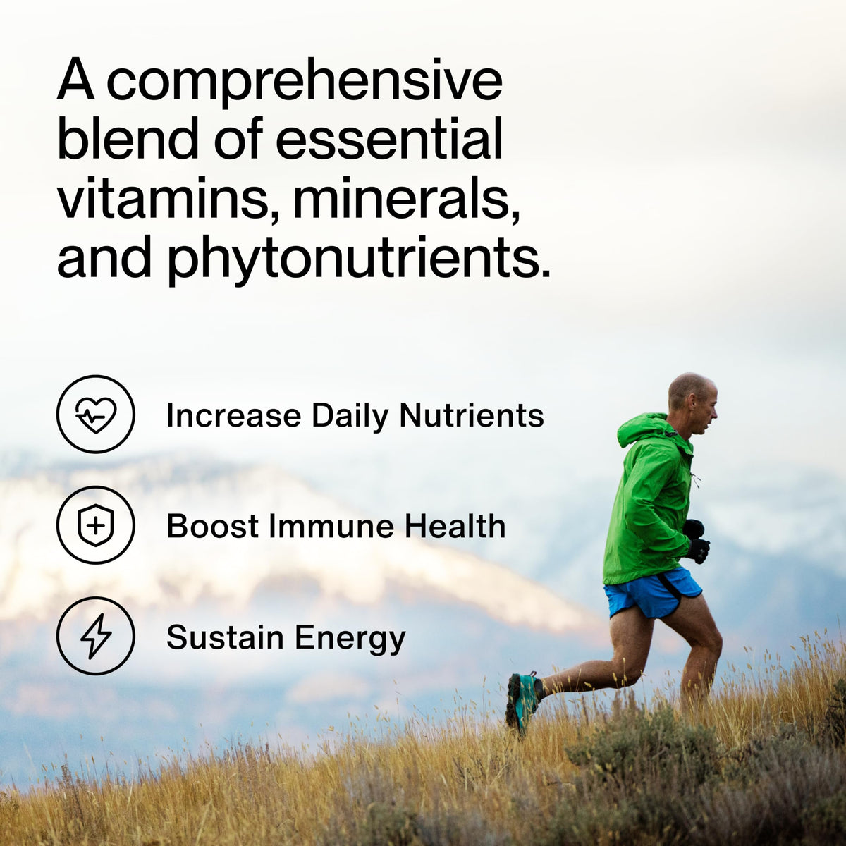 Momentous Multivitamine Complète capsules sur une surface blanche