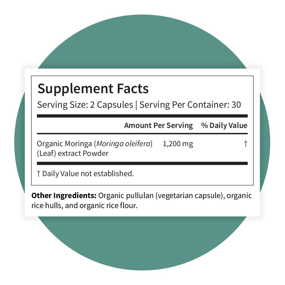 Moringa Oleifera en capsules avec des feuilles de Moringa