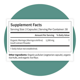Moringa Oleifera en capsules avec des feuilles de Moringa