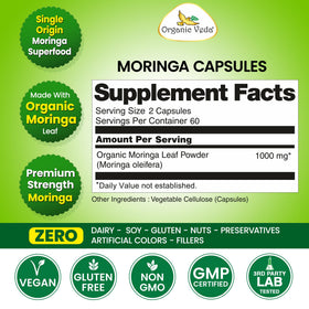 Moringa Organic Veda avec un verre d'eau