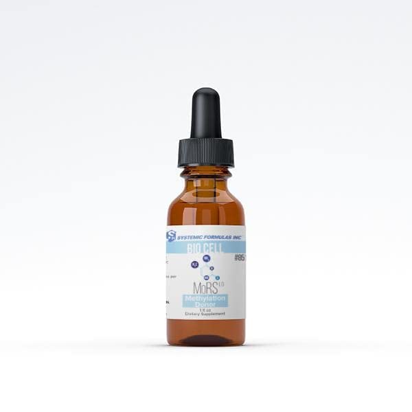 MORS LQ de Systemic Formulas sur une table avec des plantes