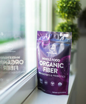 MRM Fibre Alimentaire Bio 272g poudre dans une cuillère