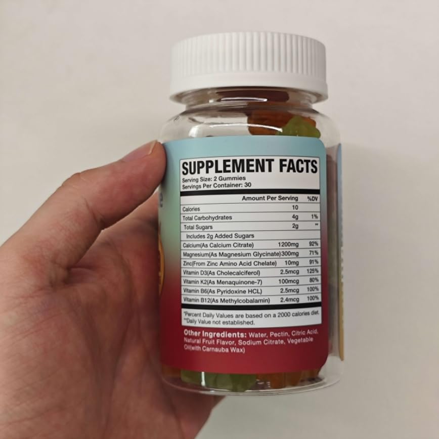 MSLOTAL Gummies de Citrate de Calcium 1200 mg avec Vitamine D3 - sur une table