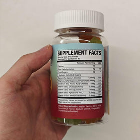 MSLOTAL Gummies de Citrate de Calcium 1200 mg avec Vitamine D3 - sur une table