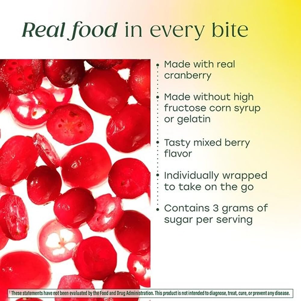 Multivitamines Femme MegaFood sur une table avec des fruits