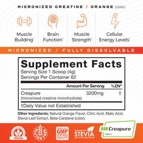 Muscle Feast Créatine Monohydrate poudre orange sur une cuillère