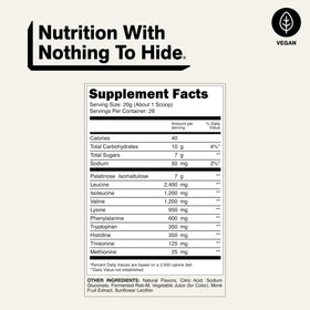 NAKED Poudre d'Acides Aminés EAAs 590g sur une table de gym