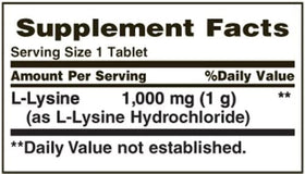 Nature's Bounty L-Lysine 240 comprimés sur fond blanc avec éclairage