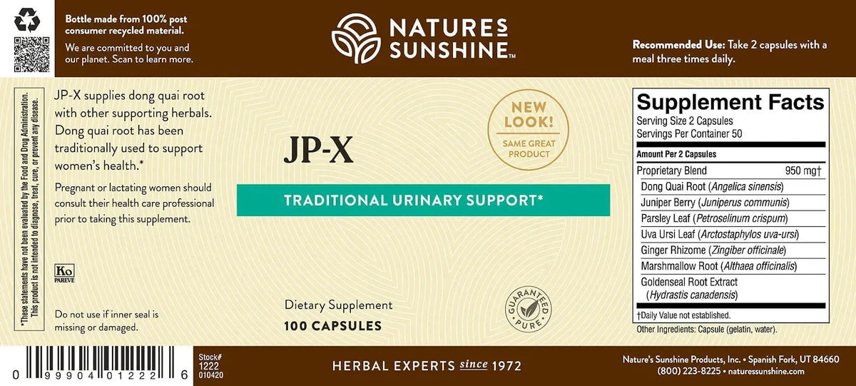 Nature's Sunshine JP-X capsules sur une table en bois