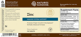 Nature's Sunshine Zinc 25mg comprimés avec un verre d'eau