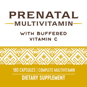 Nature's Way Multivitamines Prénatales 180 gélules à côté d'un verre d'eau