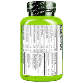 NATURELO Multivitamines Entières, capsules végétales sur une cuillère