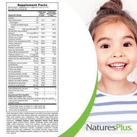 NaturesPlus Animal Parade Multivitamines Liquides 30 OZ sur un fond de fruits