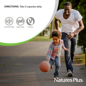 NaturesPlus Cranberry 500 mg capsules avec un verre d'eau