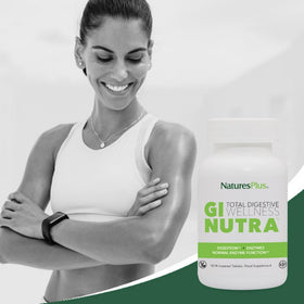 NaturesPlus GI Natural Total daily Wellness 90 comprimés bi-couches sur une table