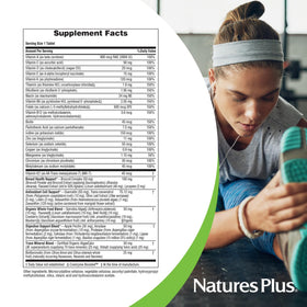NaturesPlus Her Journey 45+ comprimés dans une main