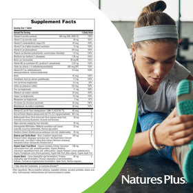 NaturesPlus Her Journey Multivitamine Femme 30 Comprimés, comprimé sur une cuillère