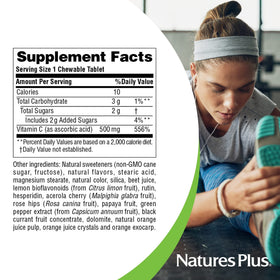 NaturesPlus Jus d'Orange comprimés à mâcher dans une main