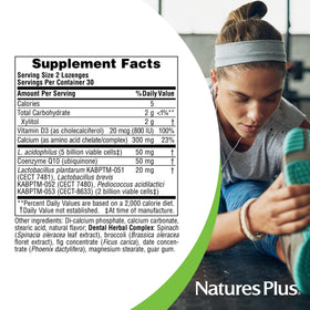 NaturesPlus Probiotique Dentaire 60 pastilles menthe, gros plan sur une pastille
