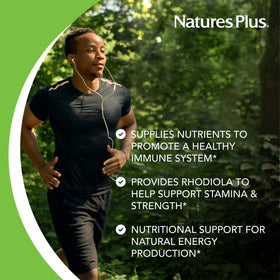 NaturesPlus Source of Life Men comprimés dans une main pour échelle